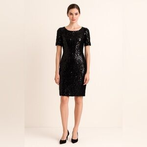Akira black sequin lined cocktail dress with low back. Size S